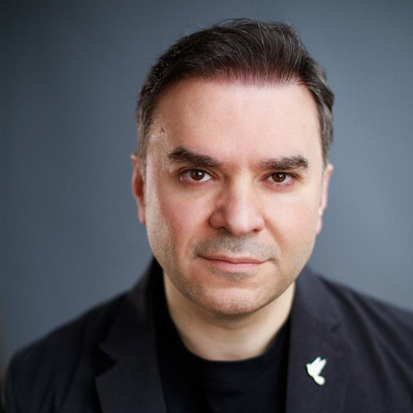 Professor Ali Ghanem, a world-renowned facial plastic surgeon, in a professional portrait.